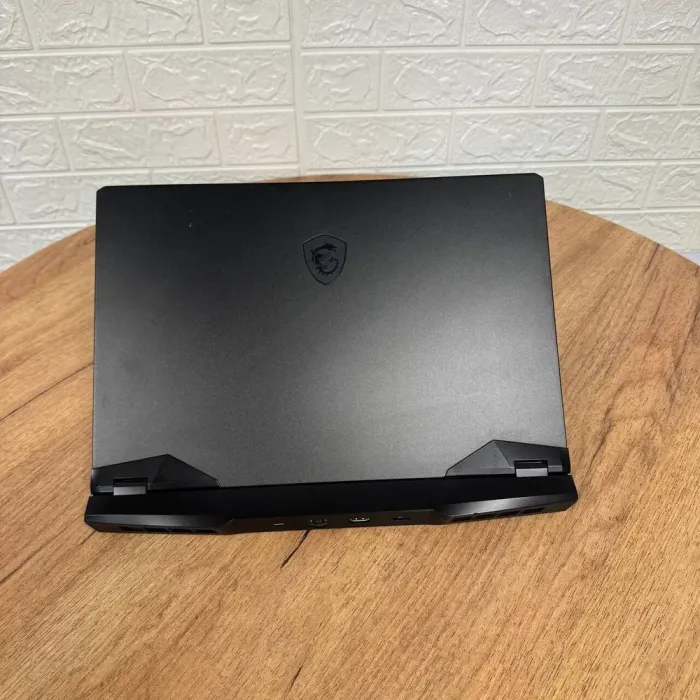 Ігровий ноутбук Б-клас MSI GP66 Leopard 10UG / 15.6" (1920x1080) IPS / Intel Core i7-10750H (6 (12) ядер по 2.6 - 5.0 GHz) / 16 GB DDR4 / 512 GB SSD NVMe / nVidia GeForce RTX 3070, 8 GB GDDR6, 256-bit / WebCam б/в - зображення 3