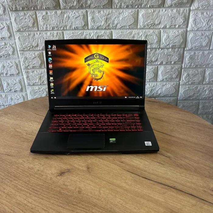 Ігровий ноутбук MSI GF65 Thin 10SDR / 15.6" (1920x1080) IPS / Intel Core i7-10750H (6 (12) ядер по 2.6 - 5.0 GHz) / 8 GB DDR4 / 512 GB SSD / nVidia GeForce GTX 1660 Ti, 6 GB GDDR6, 192-bit / WebCam б/в - зображення 2