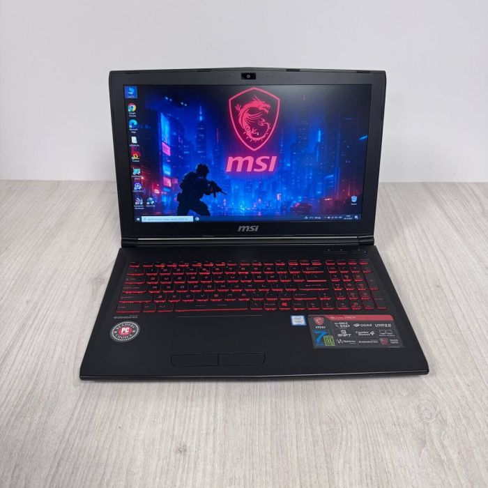 Ігровий ноутбук Б-класу MSI GL62M 7REX / 15,6" (1920x1080) TN / Intel Core i7-7700HQ (4 (8) ядра по 2,8 - 3,8 ГГц) / 16 ГБ DDR4 / 128 ГБ SSD NVMe + 1000 ГБ HDD / nVidia GeForce GTX 1050 Ti, 4 ГБ GDDR5, 128-біт / Веб-камера б/в - зображення 2