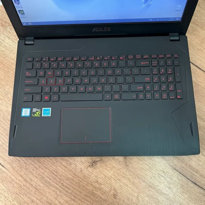 Ігровий ноутбук Б-клас Asus FX502VMZ / 15.6" (1920x1080) IPS / Intel Core i7-7700HQ (4 (8) ядра по 2.8 - 3.8 GHz) / 8 GB DDR4 / 128 GB SSD + 1000 GB HDD / nVidia GeForce GTX 1060, 3 GB GDDR5, 192-bit / WebCam б/в - зображення 7