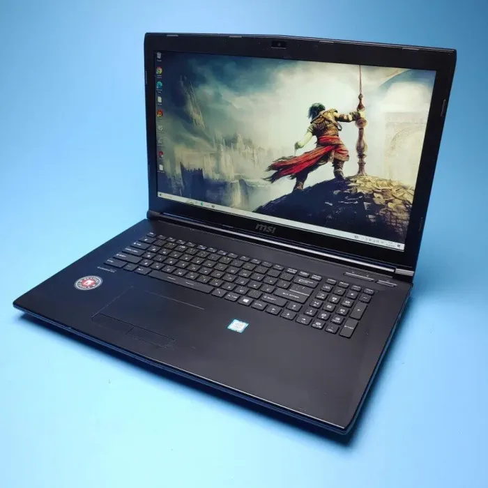 Ігровий ноутбук MSI GE72VR 7RF Apache Pro / 17.3" (1920x1080) TN / Intel Core i7-7700HQ (4 (8) ядра по 2.8 - 3.8 GHz) / 16 GB DDR4 / 512 GB SSD / nVidia GeForce GTX 1050, 2 GB GDDR5, 192-bit / WebCam / Win 10 Home б/в - зображення 2