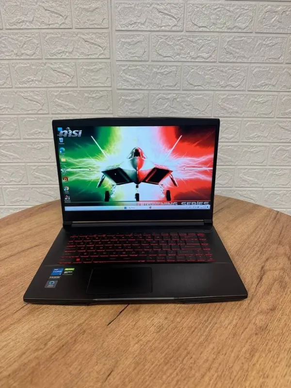 Ігровий ноутбук Б-клас MSI GV15 Thin 11SCV / 15.6" (1920x1080) IPS / Intel Core i5-11400H (6 (12) ядер по 2.7 - 4.5 GHz) / 8 GB DDR4 / 256 GB SSD / nVidia GeForce GTX 1650 Max-Q, 4 GB GDDR6, 128-bit / WebCam б/в - зображення 2