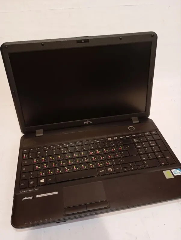 Ультрабук Б-клас Fujitsu Lifebook AH502 / 15.6" (1366x768) TN / Intel Pentium 2020M (2 ядра по 2.4 GHz) / 8 GB DDR3 / 128 GB SSD / Intel HD Graphics / WebCam / DVD-ROM / АКБ не тримає б/в - зображення 3