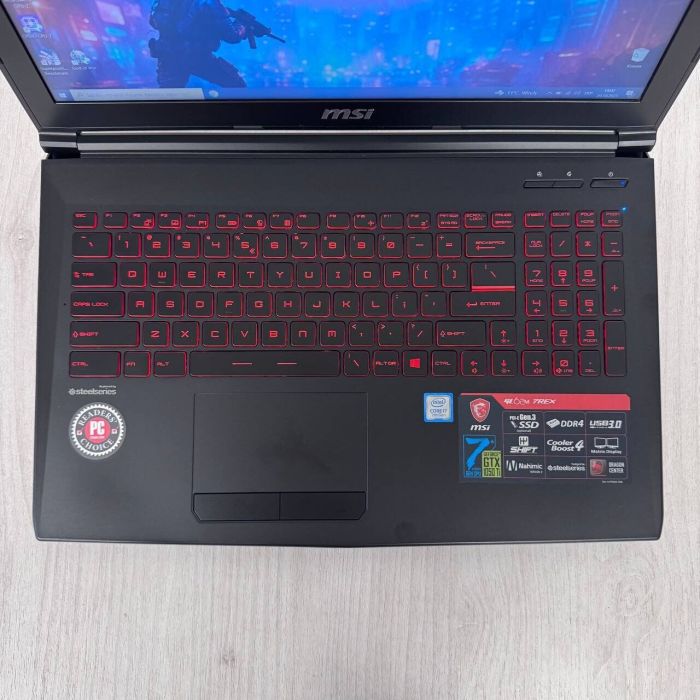 Ігровий ноутбук Б-класу MSI GL62M 7REX / 15,6" (1920x1080) TN / Intel Core i7-7700HQ (4 (8) ядра по 2,8 - 3,8 ГГц) / 16 ГБ DDR4 / 128 ГБ SSD NVMe + 1000 ГБ HDD / nVidia GeForce GTX 1050 Ti, 4 ГБ GDDR5, 128-біт / Веб-камера б/в - зображення 8