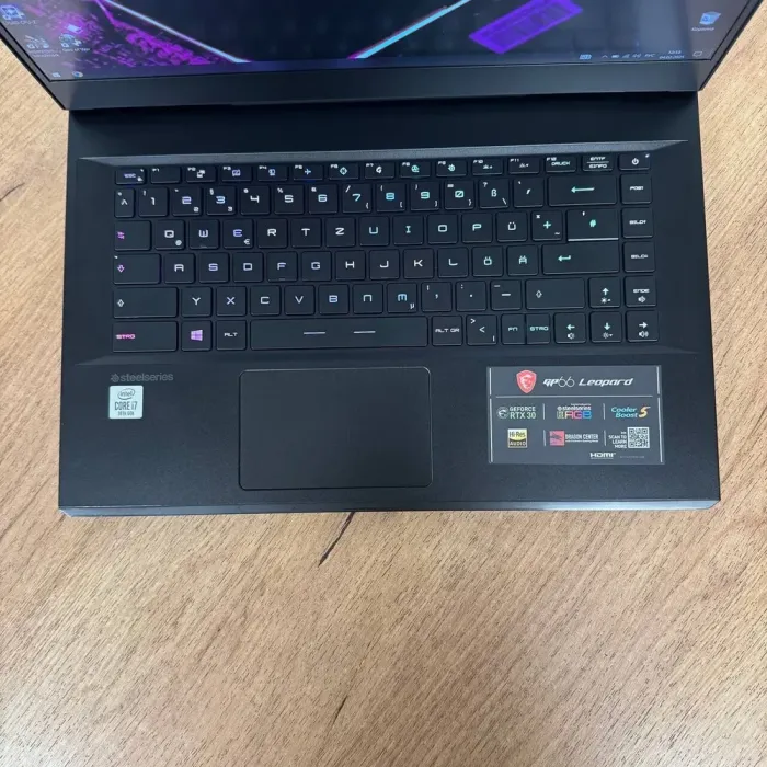 Ігровий ноутбук Б-клас MSI GP66 Leopard 10UG / 15.6" (1920x1080) IPS / Intel Core i7-10750H (6 (12) ядер по 2.6 - 5.0 GHz) / 16 GB DDR4 / 512 GB SSD NVMe / nVidia GeForce RTX 3070, 8 GB GDDR6, 256-bit / WebCam б/в - зображення 7