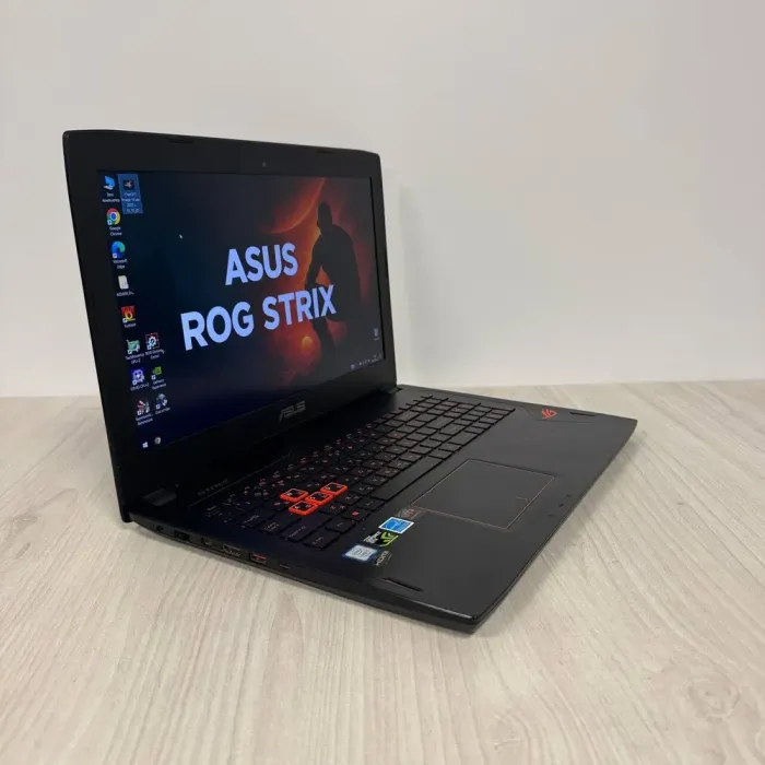 Ігровий ноутбук Б-класу Asus ROG Strix GL502VM / 15.6" (1920x1080) IPS / Intel Core i7-7700HQ (4 (8) ядра по 2.8 - 3.8 GHz) / 16 GB DDR4 / 128 GB SSD NVMe + 1000 GB HDD / nVidia GeForce GTX 1060, 3 GB GDDR5, 192-bit / WebCam б/в - зображення 4
