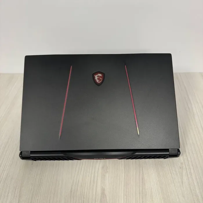 Ігровий ноутбук MSI GE75 Raider 10SFS / 17.3" (1920x1080) IPS / Intel Core i7-10750H (6 (12) ядер по 2.6 - 5.0 GHz) / 16 GB DDR4 / 128 GB SSD NVMe + 1000 GB HDD / nVidia GeForce RTX 2060, 6 GB GDDR6, 192-bit / WebCam б/в - зображення 3