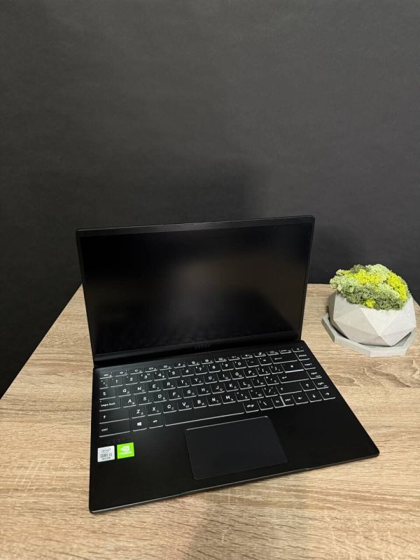 Ультрабук MSI MS-14D1 / 14" (1920x1080) TN / Intel Core i5-10210U (4 (8) ядра по 1.6 - 4.2 GHz) / 8 GB DDR4 / 256 GB SSD / nVidia GeForce MX330, 2 GB GDDR5, 64-bit / WebCam б/в - зображення 2