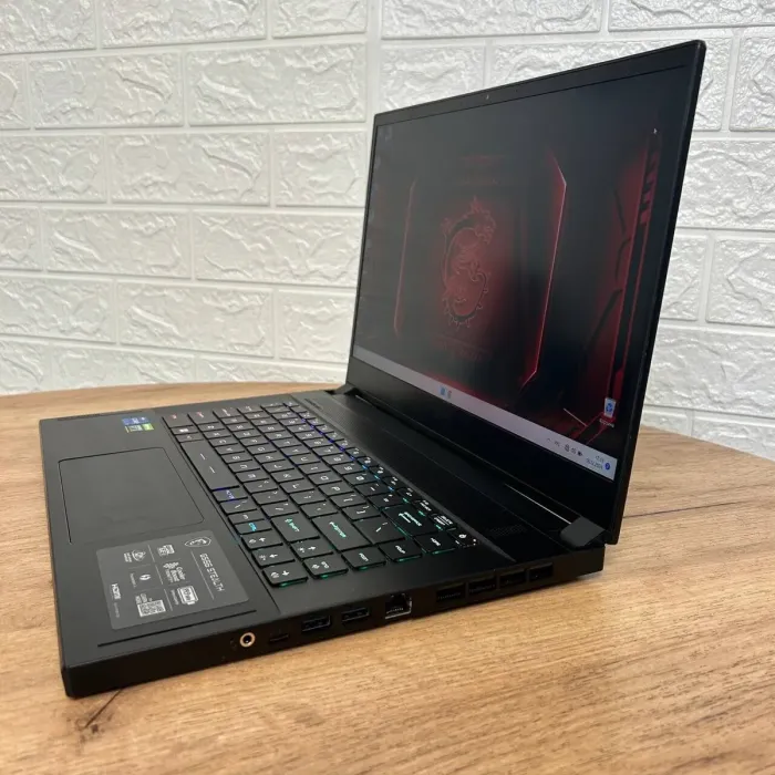 Ігровий ноутбук Б-клас MSI GS66 Stealth 11UG / 15.6" (1920x1080) IPS / Intel Core i7-11800H (8 (16) ядер по 2.3 - 4.6 GHz) / 16 GB DDR4 / 1000 GB SSD NVMe / nVidia GeForce RTX 3070, 8 GB GDDR6, 256-bit / WebCam б/в - зображення 5