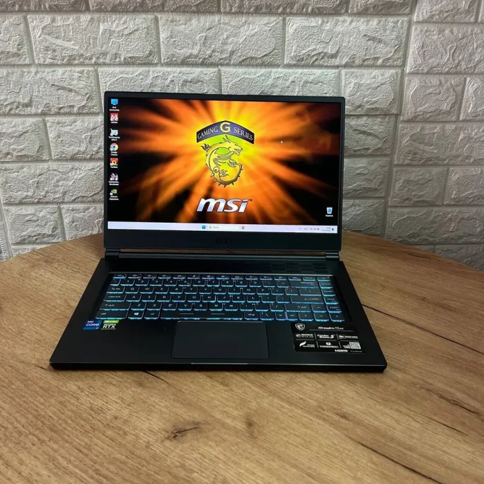 Ігровий ноутбук MSI Stealth 15M A11UEKV / 15.6" (1920x1080) IPS / Intel Core i7-11375H (4 (8) ядра по 3.0 - 5.0 GHz) / 16 GB DDR4 / 512 GB SSD / nVidia GeForce RTX 3060, 6 GB GDDR6, 192-bit / WebCam б/в - зображення 2