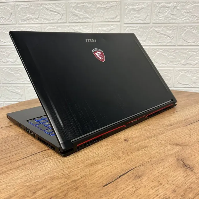 Ігровий ноутбук Б-клас MSI GS63VR Stealth 6RF / 15.6" (1920x1080) IPS / Intel Core i7-6700HQ (4 (8) ядра по 2.6 - 3.5 GHz) / 16 GB DDR4 / 128 GB SSD M.2 + 1000 GB HDD / nVidia GeForce GTX 1060, 6 GB GDDR5, 192-bit / WebCam б/в - зображення 6