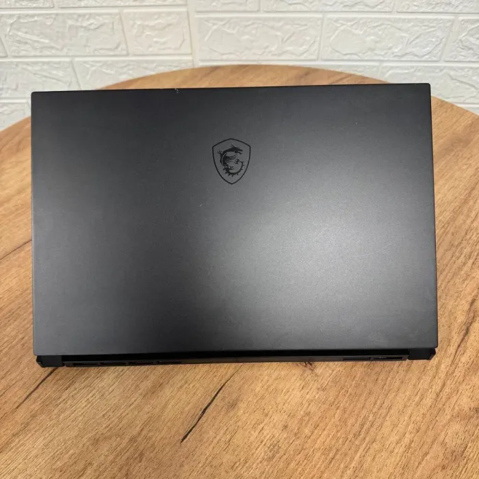 Ігровий ноутбук Б-клас MSI GS66 Stealth 10SE / 15.6" (1920x1080) IPS / Intel Core i7-10750H (6 (12) ядер по 2.6 - 5.0 GHz) / 16 GB DDR4 / 512 GB SSD / nVidia GeForce RTX 2060, 6 GB GDDR6, 192-bit / WebCam б/в - зображення 3