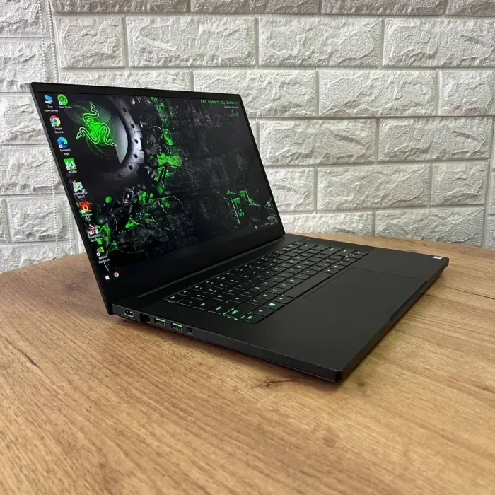 Ігровий ноутбук Б-клас Razer Blade 15 RZ09-0300 / 15.6" (1920x1080) IPS / Intel Core i7-9750H (6 (12) ядер по 2.6 - 4.5 GHz) / 16 GB DDR4 / 128 GB SSD M.2 + 1000 GB HDD / nVidia GeForce RTX 2060, 6 GB GDDR6, 192-bit / WebCam б/в - зображення 4