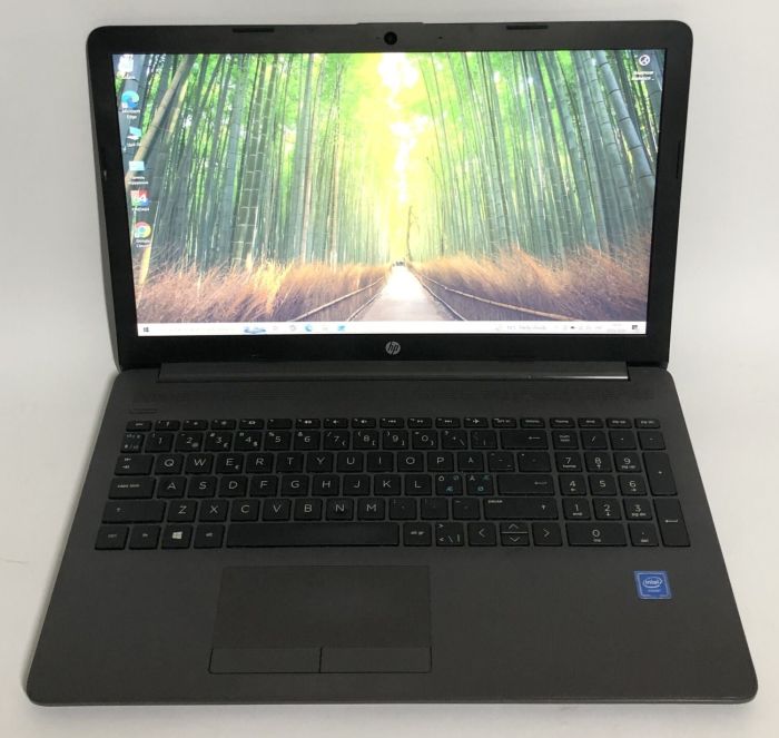 Ноутбук Б-клас HP 250 G7 Grey / 15.6" (1920x1080) TN / Intel Celeron N4000 (2 ядра по 1.1 - 2.6 GHz) / 8 GB DDR4 / 128 GB SSD / Intel UHD Graphics 600 / WebCam / Win 10 Home б/в - зображення 2