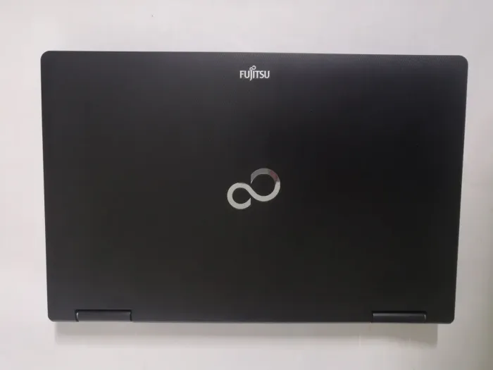 Ноутбук Fujitsu Lifebook E751 / 15.6" (1600x900) TN / Intel Core i5-2410M (2 (4) ядра по 2.3 - 2.9 GHz) / 4 GB DDR3 / 320 GB HDD / Intel HD Graphics 3000 / WebCam / DVD-ROM / VGA / АКБ NEW б/в - зображення 7