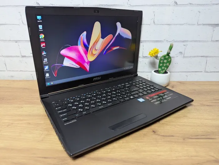 Ігровий ноутбук Б-клас MSI GP62 6QE MS-16J5 / 15.6" (1920x1080) TN / Intel Core i7-6700HQ (4 (8) ядра по 2.6 - 3.5 GHz) / 16 GB DDR4 / 256 GB SSD + 1000 GB HDD / nVidia GeForce GTX 960M, 4 GB GDDR5, 128-bit / WebCam / DVD-ROM б/в - зображення 3