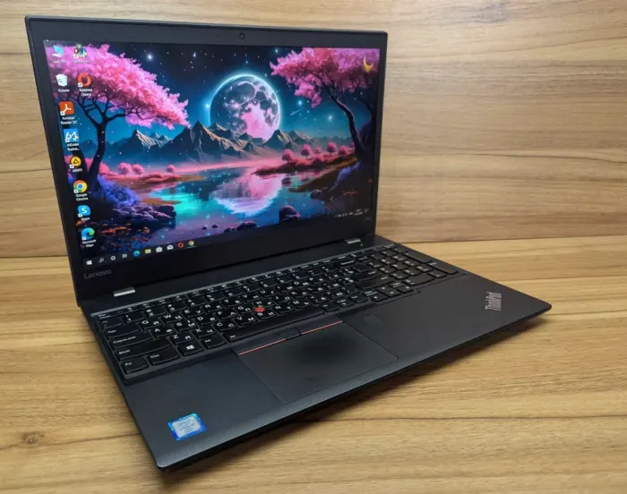 Ноутбук Lenovo ThinkPad T570 / 15.6" (1920x1080) IPS / Intel Core i7-6600U (2 (4) ядра по 2.6 - 3.4 GHz) / 8 GB DDR4 / 240 GB SSD / Intel HD Graphics 520 / WebCam / Fingerprint / Windows 10 б/в - зображення 4