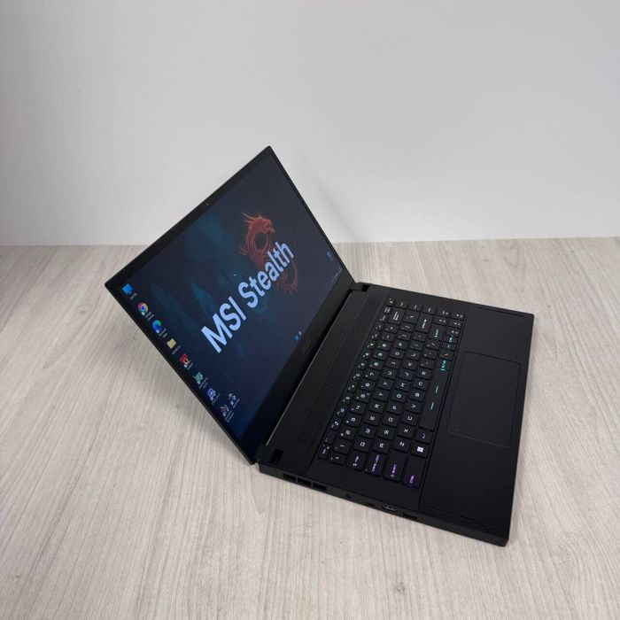 Ігровий ноутбук MSI Stealth GS66 12UGS / 15,6" (1920x1080) IPS / Intel Core i9-12900H (14 (20) ядер по 3,8 - 5,0 ГГц) / 32 ГБ DDR5 / 1000 ГБ SSD / nVidia GeForce RTX 3070 Ti, 8 ГБ GDDR6, 256-біт / Веб-камера б/в - зображення 4