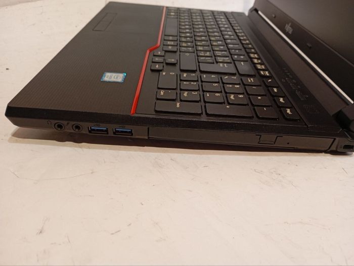 Ноутбук Б-клас Fujitsu LifeBook E556 / 15.6" (1366x768) TN / Intel Core i5-6200U (2 (4) ядра по 2.3 - 2.8 GHz) / 8 GB DDR4 / 240 GB SSD / Intel HD Graphics 520 / WebCam / DVD-RW б/в - зображення 5