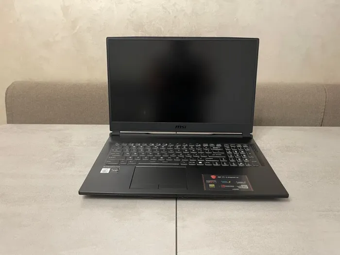 Ігровий ноутбук MSI GL75 Leopard 10SFK-029US / 17.3" (1920x1080) IPS / Intel Core i7-10750H (6 (12) ядер по 2,6 - 5,0 ГГц) / 16 ГБ DDR4 / 512 ГБ SSD M.2 + 500 ГБ HDD / nVidia GeForce RTX 2070, 8 ГБ GDDR6, 256-біт / WebCam б/в - зображення 3