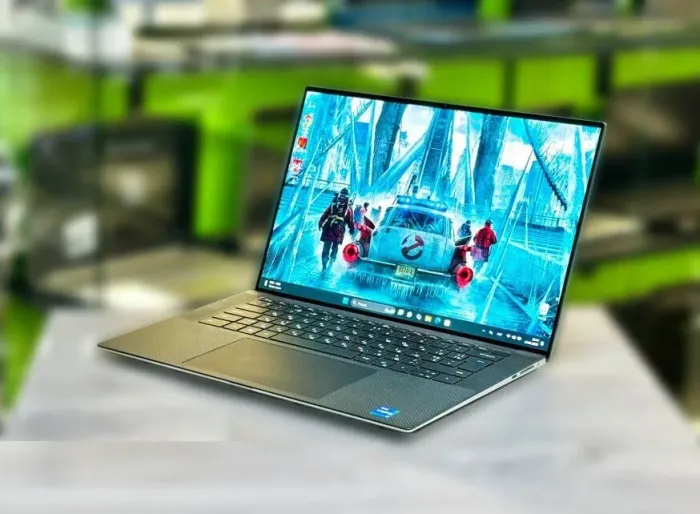 Ігровий ноутбук Dell XPS 15 9510 / 15.6" (3456x2160) OLED Touch / Intel Core i7-11800H (8 (16) ядер по 4.6 GHz) / 32 GB DDR4 / 1000 GB SSD / nVidia GeForce RTX 3050 Ti, 4 GB GDDR6, 128-bit / WebCam / Win 11 Home б/в - зображення 4