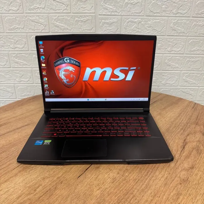 Ігровий ноутбук Б-клас MSI GF63 Thin 11UD / 15.6" (1920x1080) IPS / Intel Core i5-11400H (6 (12) ядер по 2.7 - 4.5 GHz) / 16 GB DDR4 / 512 GB SSD / nVidia GeForce RTX 3050 Ti, 4 GB GDDR6, 128-bit / WebCam б/в - зображення 2