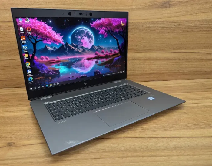 Мобільна робоча станція HP zBook Studio G5 / 15,6" (1920x1080) IPS / Intel Core i9-9880H (8 (16) ядер по 2,3 - 4,8 ГГц) / 16 ГБ DDR4 / 512 ГБ SSD / nVidia Quadro P1000, 4 ГБ GDDR5, 128-біт / WebCam / TouchID / Windows 10 б/в - зображення 4