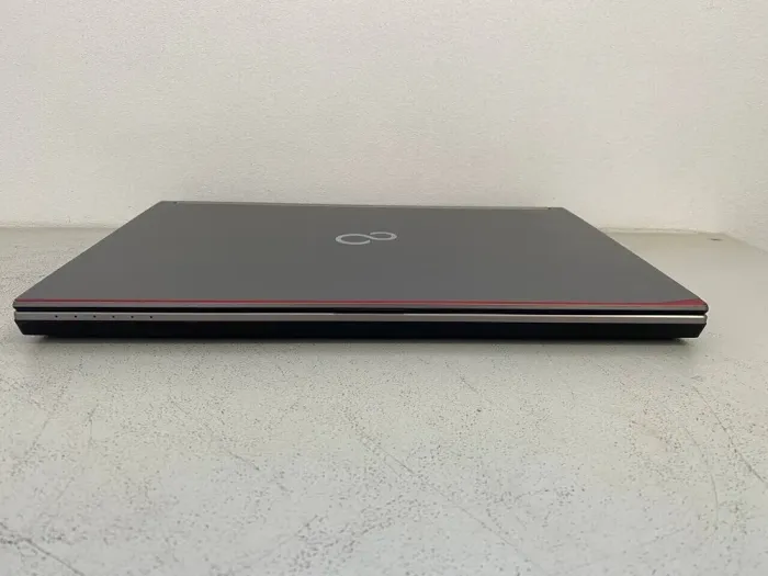 Мобільна робоча станція Fujitsu Celsius H730 / 15.6" (1920x1080) IPS / Intel Core i7-4800MQ (4 (8) ядра по 2.7 - 3.7 GHz) / 32 GB DDR3 / 256 GB SSD / nVidia Quadro K1100M, 2 GB GDDR5, 128-bit / WebCam / DVD-ROM б/в - зображення 6