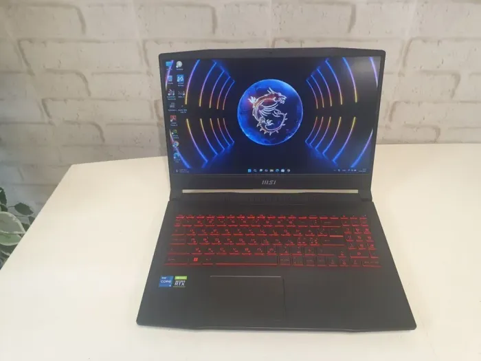 Ігровий ноутбук MSI Katana GF66 11UE-1006NEU / 15.6" (1920x1080) IPS / Intel Core i5-11400H (6 (12) ядер по 2.2 - 4.5 GHz) / 16 GB DDR4 / 512 GB SSD / nVidia GeForce RTX 3060, 6 GB GDDR6, 192-bit / WebCam б/в - зображення 2
