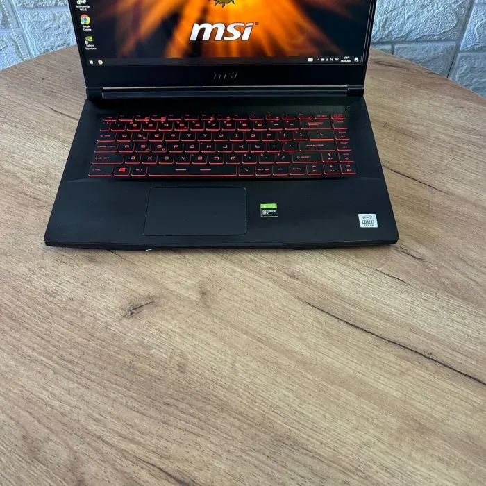 Ігровий ноутбук MSI GF65 Thin 10SDR / 15.6" (1920x1080) IPS / Intel Core i7-10750H (6 (12) ядер по 2.6 - 5.0 GHz) / 8 GB DDR4 / 512 GB SSD / nVidia GeForce GTX 1660 Ti, 6 GB GDDR6, 192-bit / WebCam б/в - зображення 7