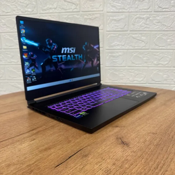 Ігровий ноутбук Б-клас MSI Stealth 15M A11UEKV / 15.6" (1920x1080) IPS / Intel Core i7-11375H (4 (8) ядра по 3.0 - 5.0 GHz) / 16 GB DDR4 / 512 GB SSD NVMe / nVidia GeForce RTX 3060, 6 GB GDDR6, 192-bit / WebCam б/в - зображення 4