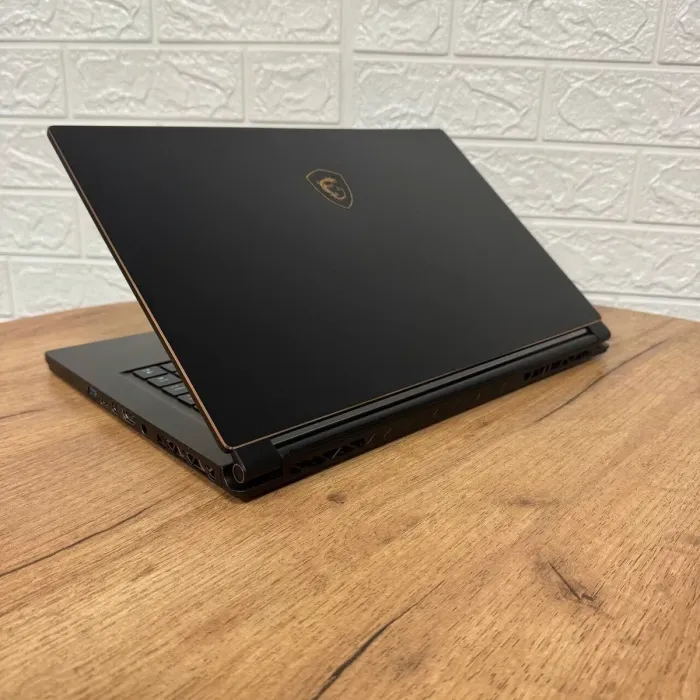 Ігровий ноутбук Б-клас MSI GS65 Stealth 9SG / 15.6" (1920x1080) IPS / Intel Core i7-9750H (6 (12) ядер по 2.6 - 4.5 GHz) / 16 GB DDR4 / 512 GB SSD / nVidia GeForce RTX 2080 Max-Q, 8 GB GDDR6, 256-bit / WebCam б/в - зображення 6