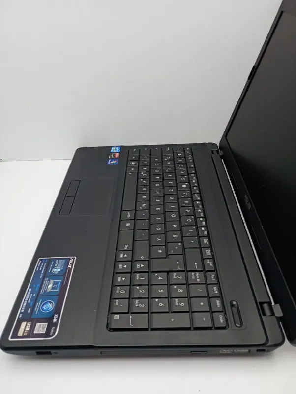 Ноутбук Asus K54 / 15.6" (1366x768) TN / Intel Core i3-2330M (2 (4) ядра по 2.2 GHz) / 4 GB DDR3 / 320 GB HDD / AMD Radeon HD 6470M, 1 GB DDR3, 64-bit / WebCam б/в - зображення 4