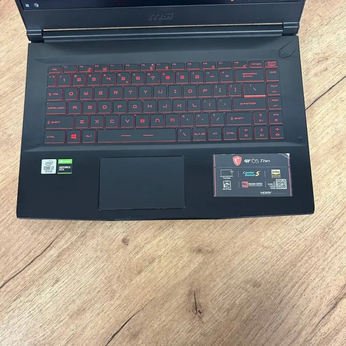 Ігровий ноутбук Б-клас MSI GF65 Thin 10SDR / 15.6" (1920x1080) IPS / Intel Core i7-10750H (6 (12) ядер по 2.6 - 5.0 GHz) / 16 GB DDR4 / 512 GB SSD / nVidia GeForce GTX 1660 Ti, 6 GB GDDR6, 192-bit / WebCam б/в - зображення 7