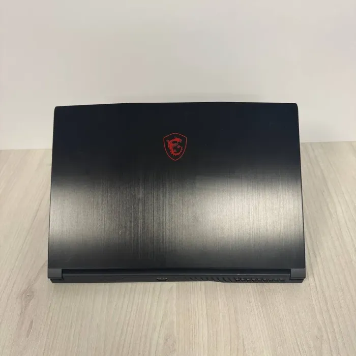 Ігровий ноутбук Б-класу MSI GF63 Thin 11UC / 15.6" (1920x1080) IPS / Intel Core i5-11400H (6 (12) ядер по 2,7 - 4,5 ГГц) / 8 ГБ DDR4 / 512 ГБ SSD NVMe / nVidia GeForce RTX 3050, 4 ГБ GDDR6, 128-bit / WebCam б/в - зображення 3