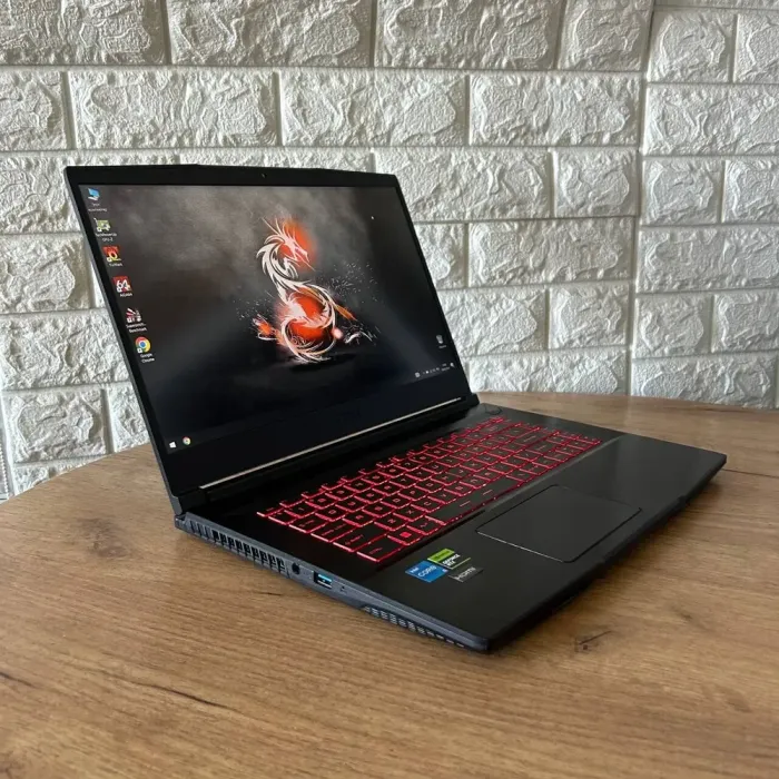 Ігровий ноутбук Б-клас MSI GF63 Thin 11UC / 15.6" (1920x1080) IPS / Intel Core i5-11400H (6 (12) ядер по 2.7 - 4.5 GHz) / 16 GB DDR4 / 512 GB SSD / nVidia GeForce RTX 3050, 4 GB GDDR6, 128-bit / WebCam б/в - зображення 4