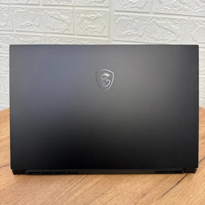 Ігровий ноутбук MSI GS66 Stealth 11UH / 15.6" (1920x1080) IPS / Intel Core i7-11800H (8 (16) ядер по 1.9 - 4.6 GHz) / 32 GB DDR4 / 1000 GB SSD / nVidia GeForce RTX 3080, 16 GB GDDR6, 256-bit / WebCam б/в - зображення 3