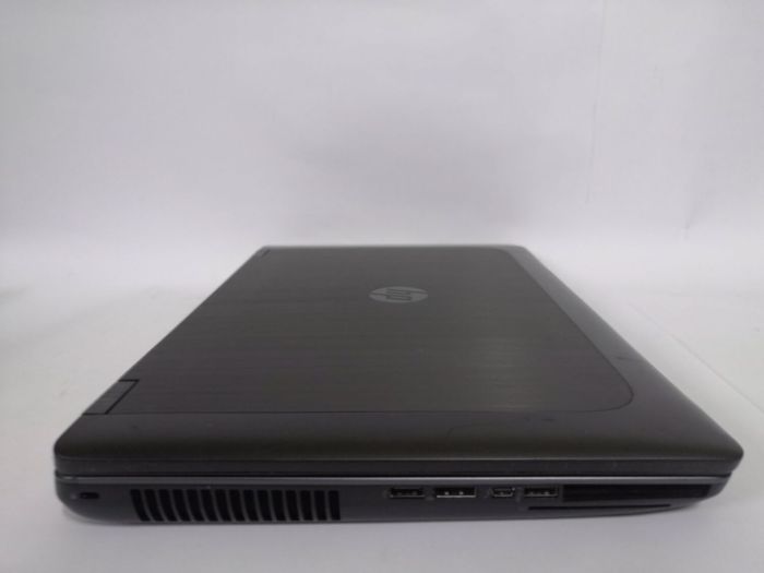 Робоча станція HP ZBook 17 G2 / 17.3" TN / Core i7-4710MQ (4(8) ядра по 2.5-3.5 GHz) / 16GB DDR3 / 256GB SSD / Quadro K3100M, 4GB GDDR5, 256-bit / WebCam / DVD-ROM б/в - зображення 4