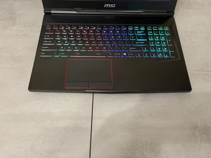 Ігровий ноутбук MSI Raider GE63 RGB 9SG / 15.6" (1920x1080) IPS / Intel Core i7-9750H (6 (12) ядер по 2.6 - 4.5 GHz) / 32 GB DDR4 / 512 GB SSD + 1000 GB HDD / nVidia GeForce RTX 2080, 8 GB GDDR6, 256-bit / WebCam б/в - зображення 4