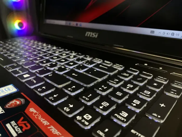 Ігровий ноутбук MSI GP62MVR 6RF Leopard Pro / 15.6" (1920x1080) IPS / Intel Core i7-7700HQ (4 (8) ядра по 2.8 - 3.8 GHz) / 8 GB DDR4 / 128 GB SSD + 1000 GB HDD / nVidia GeForce GTX 1060, 3 GB GDDR5, 192-bit / WebCam б/в - зображення 5