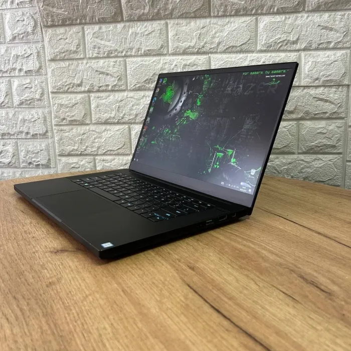 Ігровий ноутбук Б-клас Razer Blade 15 RZ09-0300 / 15.6" (1920x1080) IPS / Intel Core i7-9750H (6 (12) ядер по 2.6 - 4.5 GHz) / 16 GB DDR4 / 128 GB SSD M.2 + 1000 GB HDD / nVidia GeForce RTX 2060, 6 GB GDDR6, 192-bit / WebCam б/в - зображення 5