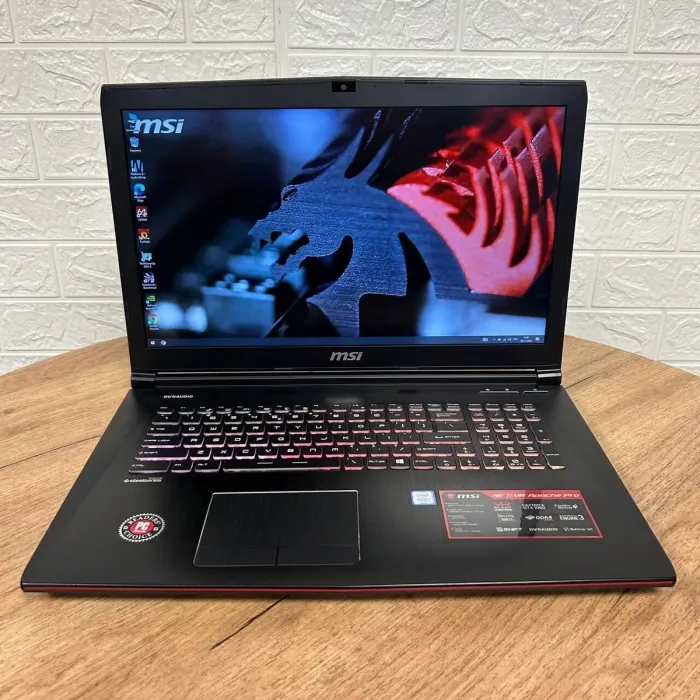 Ігровий ноутбук Б-клас MSI GE72VR 7RF Apache Pro / 17.3" (1920x1080) TN / Intel Core i7-7700HQ (4 (8) ядра по 2.8 - 3.8 GHz) / 16 GB DDR4 / 128 GB SSD M.2 + 1000 GB HDD / nVidia GeForce GTX 1060, 3 GB GDDR5, 192-bit / WebCam б/в - зображення 2