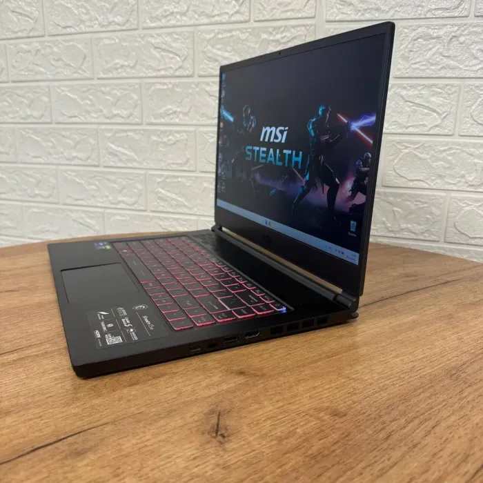 Ігровий ноутбук Б-клас MSI Stealth 15M A11UEKV / 15.6" (1920x1080) IPS / Intel Core i7-11375H (4 (8) ядра по 3.0 - 5.0 GHz) / 16 GB DDR4 / 512 GB SSD NVMe / nVidia GeForce RTX 3060, 6 GB GDDR6, 192-bit / WebCam б/в - зображення 5