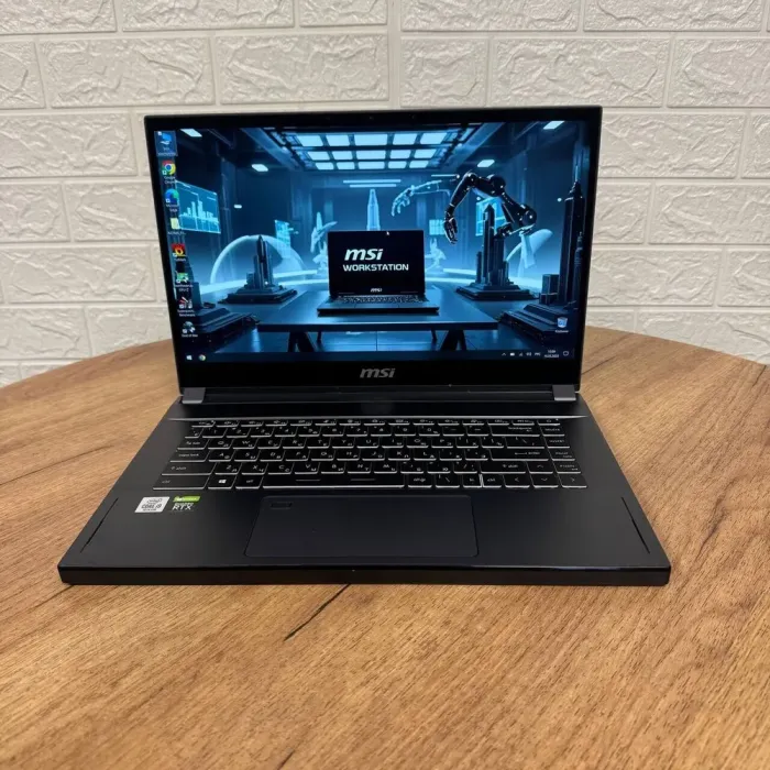 Мобільна робоча станція Б-клас MSI WS66 10TKT / 15.6" (1920x1080) IPS Touch / Intel Core i9-10980HK (8 (16) ядер по 2.4 - 5.3 GHz) / 16 GB DDR4 / 512 GB SSD NVMe / nVidia Quadro RTX 3000, 6 GB GDDR6, 192-bit / WebCam б/в - зображення 2