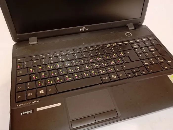 Ультрабук Б-клас Fujitsu Lifebook AH502 / 15.6" (1366x768) TN / Intel Pentium 2020M (2 ядра по 2.4 GHz) / 8 GB DDR3 / 128 GB SSD / Intel HD Graphics / WebCam / DVD-ROM / АКБ не тримає б/в - зображення 8
