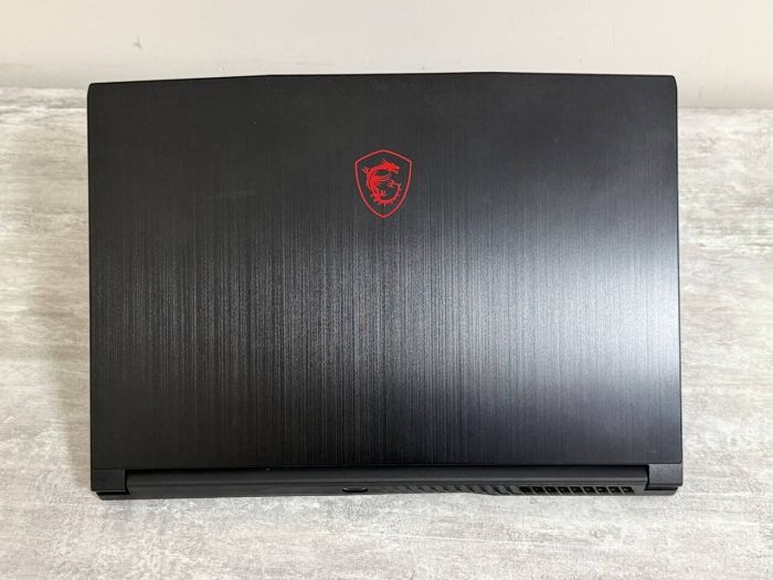 Ігровий ноутбук MSI GF63 Thin 11UC / 15,6" (1920x1080) IPS / Intel Core i5-11400H (6 (12) ядер по 2,7 - 4,5 ГГц) / 16 ГБ DDR4 / 512 ГБ SSD / nVidia GeForce RTX 3050, 4 ГБ GDDR6, 128-біт / WebCam / Win 11 Home б/в - зображення 5