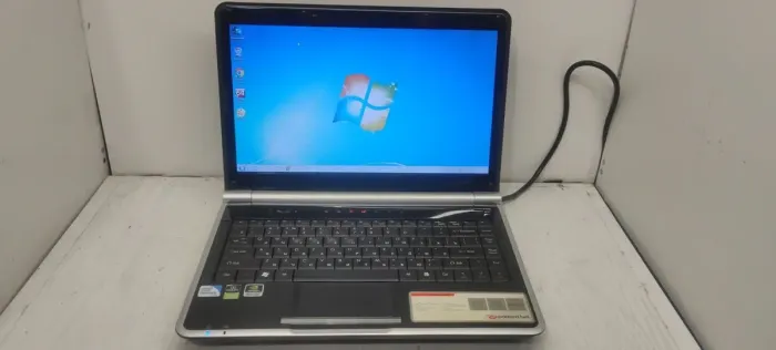 Ноутбук Б-клас Packard Bell F2365 / 14" TN / Pentium T4300 (2 ядра по 2.1GHz) / 4GB DDR3 / 120GB SSD / GeForce G105M, 512MB GDDR3, 64bit / DVD-ROM б/в - зображення 2