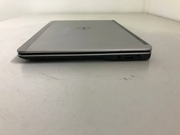 Нетбук Dell Latitude E7240 / 12.5" (1366x768) TN / Intel Core i5-4300U (2 (4) ядра по 1.9 - 2.9 GHz) / 4 GB DDR3 / 128 GB SSD / Intel HD Graphics 4400 / WebCam / HDMI б/в - зображення 4