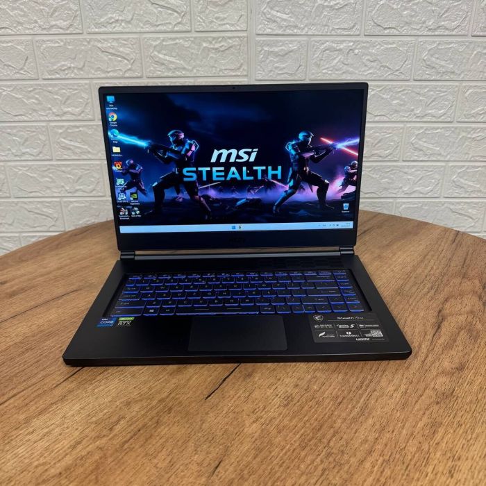 Ігровий ноутбук Б-клас MSI Stealth 15M A11UEKV / 15.6" (1920x1080) IPS / Intel Core i7-11375H (4 (8) ядра по 3.0 - 5.0 GHz) / 16 GB DDR4 / 512 GB SSD NVMe / nVidia GeForce RTX 3060, 6 GB GDDR6, 192-bit / WebCam б/в - зображення 2