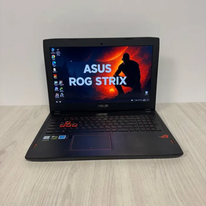 Ігровий ноутбук Б-класу Asus ROG Strix GL502VM / 15.6" (1920x1080) IPS / Intel Core i7-7700HQ (4 (8) ядра по 2.8 - 3.8 GHz) / 16 GB DDR4 / 128 GB SSD NVMe + 1000 GB HDD / nVidia GeForce GTX 1060, 3 GB GDDR5, 192-bit / WebCam б/в - зображення 2